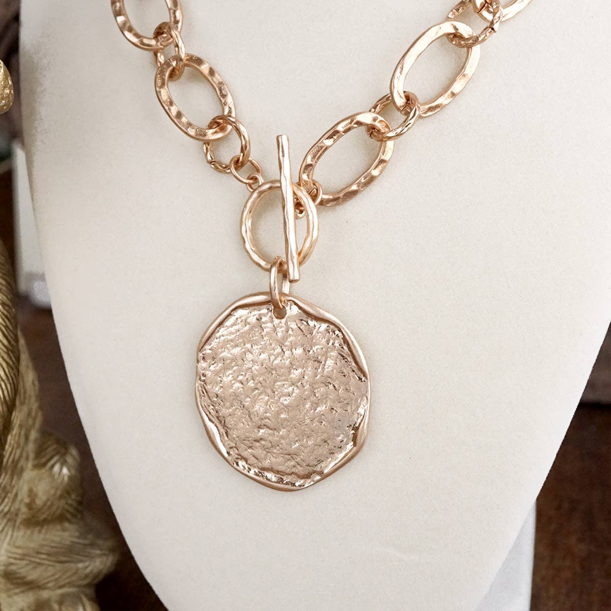 Gold Hammered Disc Toggle Statement Necklace